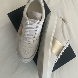 Cole Haan Gold-Trimmed White Sneakers